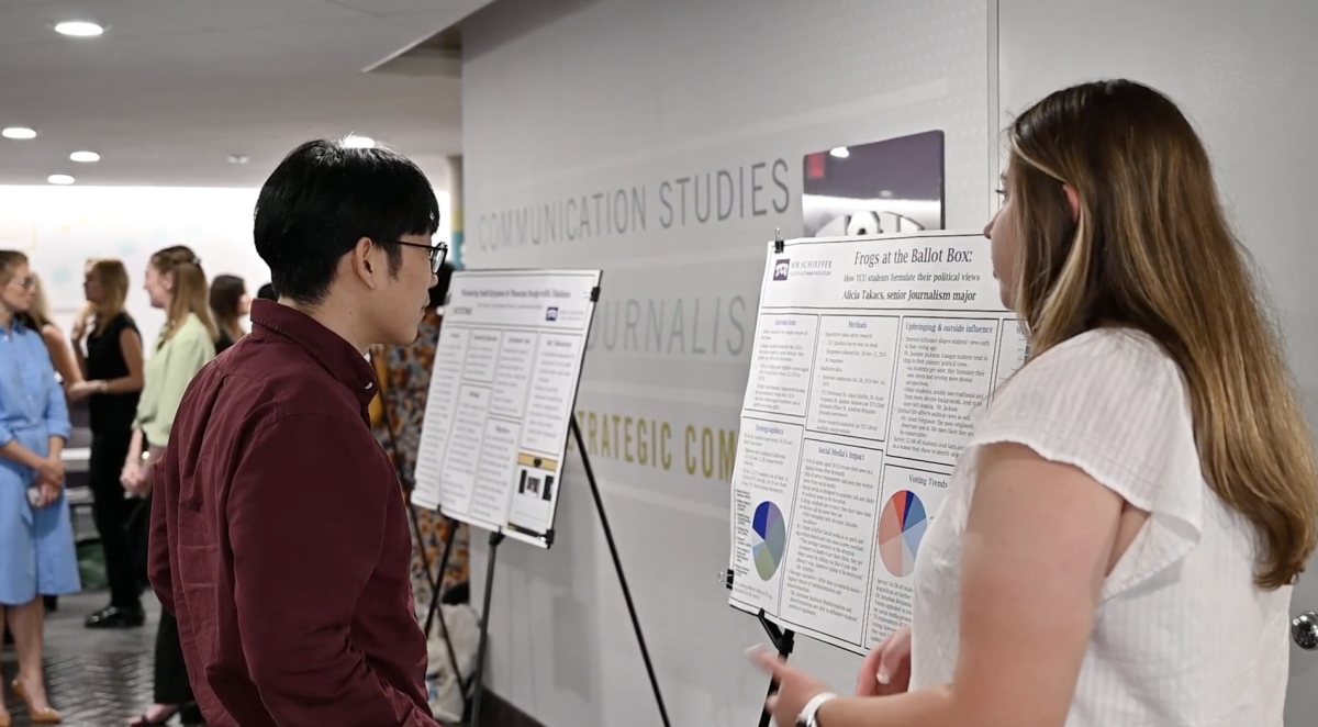 Journalism senior Alicia Tackacs explains her project during the Schieffer Showcase on April 16, 2025, in Moudy South. 